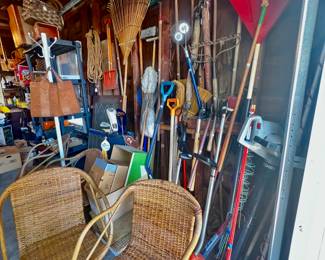 Wicker chairs, lawn and garden tools