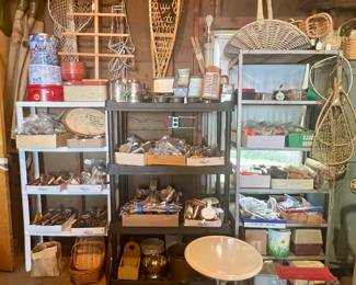 Many kitchen gadgets, cookie cutters, snow shoes, vintage sock drying forms