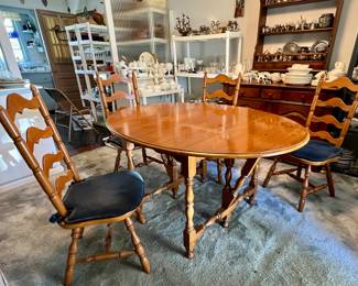 Dining table with 4 ladder back chairs, 2 leaves & pads