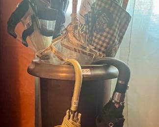 Vintage umbrella stand and umbrellas