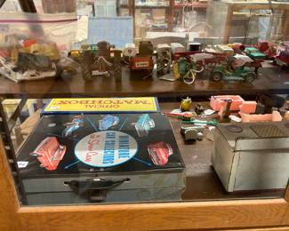 cars, car carriers, dollhouse furniture, etc.