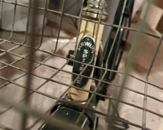 Vintage Schwinn Spitfire Bicycle – Classic Green
Cruise in timeless style with this vintage Schwinn Spitfire, made in Chicago, IL. This beautiful classic features Schwinn’s signature sturdy steel frame in a deep forest-green finish with cream accents and the original decals intact.
Features:
Iconic Schwinn Spitfire badge and headplate
Front wire basket — perfect for errands or display
Step-through frame for easy riding
Original chrome handlebars and fenders
Coaster brake and wide comfort saddle
This bike has been stored indoors and shows normal wear for its age, including some cosmetic scuffs and patina on metal parts, adding to its authentic vintage charm.
Perfect for restoration, display, or leisurely neighborhood rides.