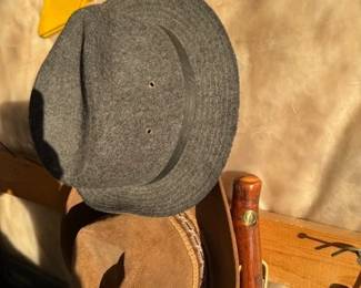 Stetson hats. Walking stick.