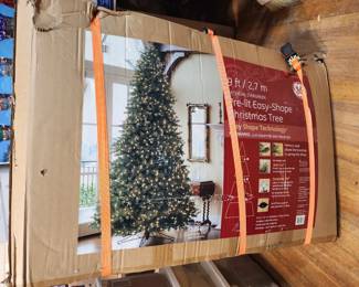 9 FT PRE LIT CHRISTMAS TREE USED ONE SEASON