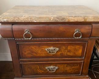 Bedside table. 1 of 2. Identical. Sturdy wood with heavy granite top. Part of bedroom set.