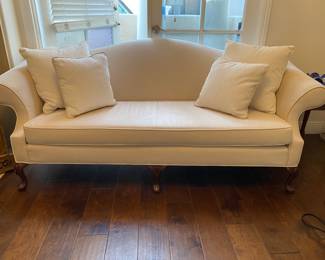 Brand new velvet upholstered couch with custom made pillows. Have two matching couches that are identical.