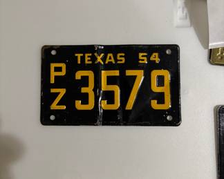 Toy license plates from 1954