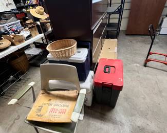 Vintage chair, old newspapers, tool box, ice chests