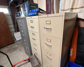 3 metal filing cabinets