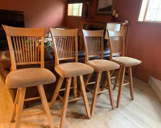 4 bar height swivel stools….cushioned seats…excellent condition.