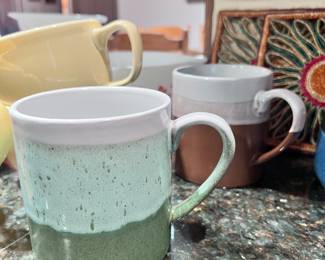 AND MORE MUGS