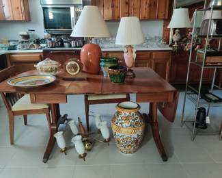 "Danish modern" table, 2 leaves and 6 chairs, Roseville planters, great clock, vintage small appliances.