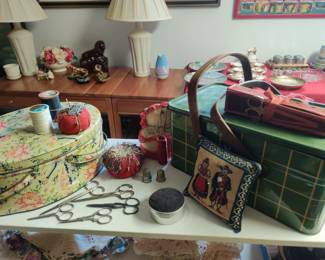 Antique sewing kits, buttons, pincushions and more