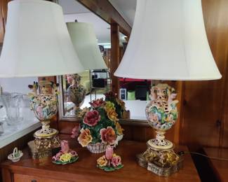 With Capodimonte candleholders and floral centerpiece