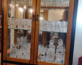 Over 100 pieces of Waterford! And beautiful curio/ china cabinet to display collection in!