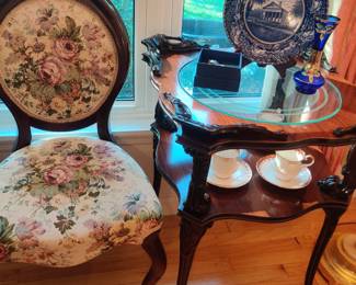 Ornate side tables with glass insert