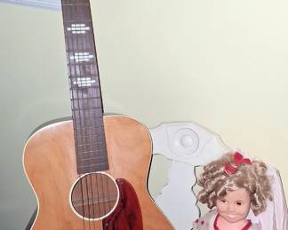 Guitar and Shirley Temple doll