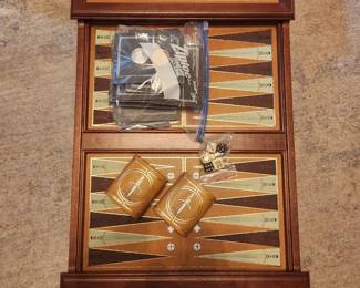 Franklin Mint Excalibur Backgammon Game. The game pieces are still in original packaging. Table top game, measures approx. 25.5" x 14.5" 