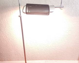 George Nelson Eyeshade Floor Lamp w/ swing arm & Round base.                                                                                    Koch & Lowy
USA, c. 1975
chrome-plated steel, enameled steel, perforated and enameled aluminum, aluminum, acrylic
50 h × 19 w × 10 d in 