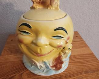 Cow over the moon cookie jar - as is (the cow has chipped ears, has been broken around the neck and sloppily repaired)
