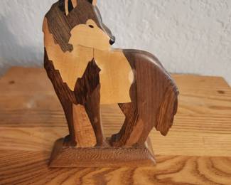 Wood carving of wolf 