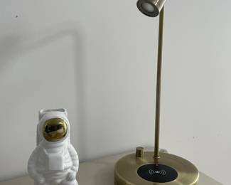 Decorative items and desk lamp.
