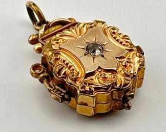 Victorian watch fob locket with glass