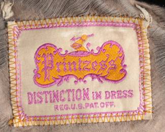 Fantastic very late 1910s to early 20s Womens suit label