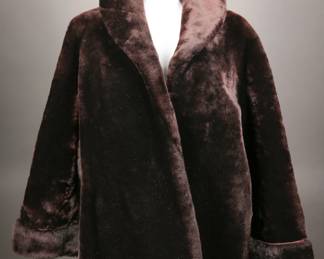 Lush 1940s to 1950s dark brown sheared mouton fur coat