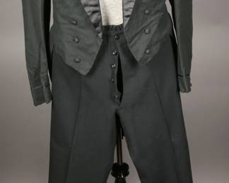 Very cool later 1920s to early 1930s 2 piece tuxedo with cutaway tails and button fly pants.