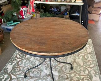 Round metal patio table w/ wood topper and two custom tablecloths 