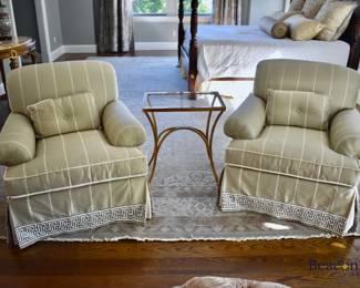 Pair of custom upholstered club chairs with Greek key trim