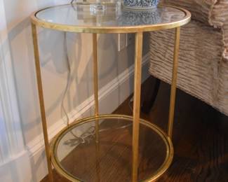 Round glass top tiered table