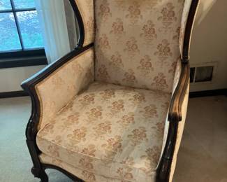 Antique wingback chair w mahogany wood trim and tan upholstery