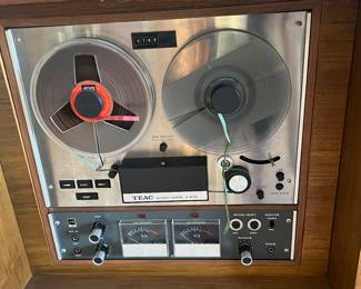 Includes a TEAC A-4010S automatic reverse reel-to-reel tape deck