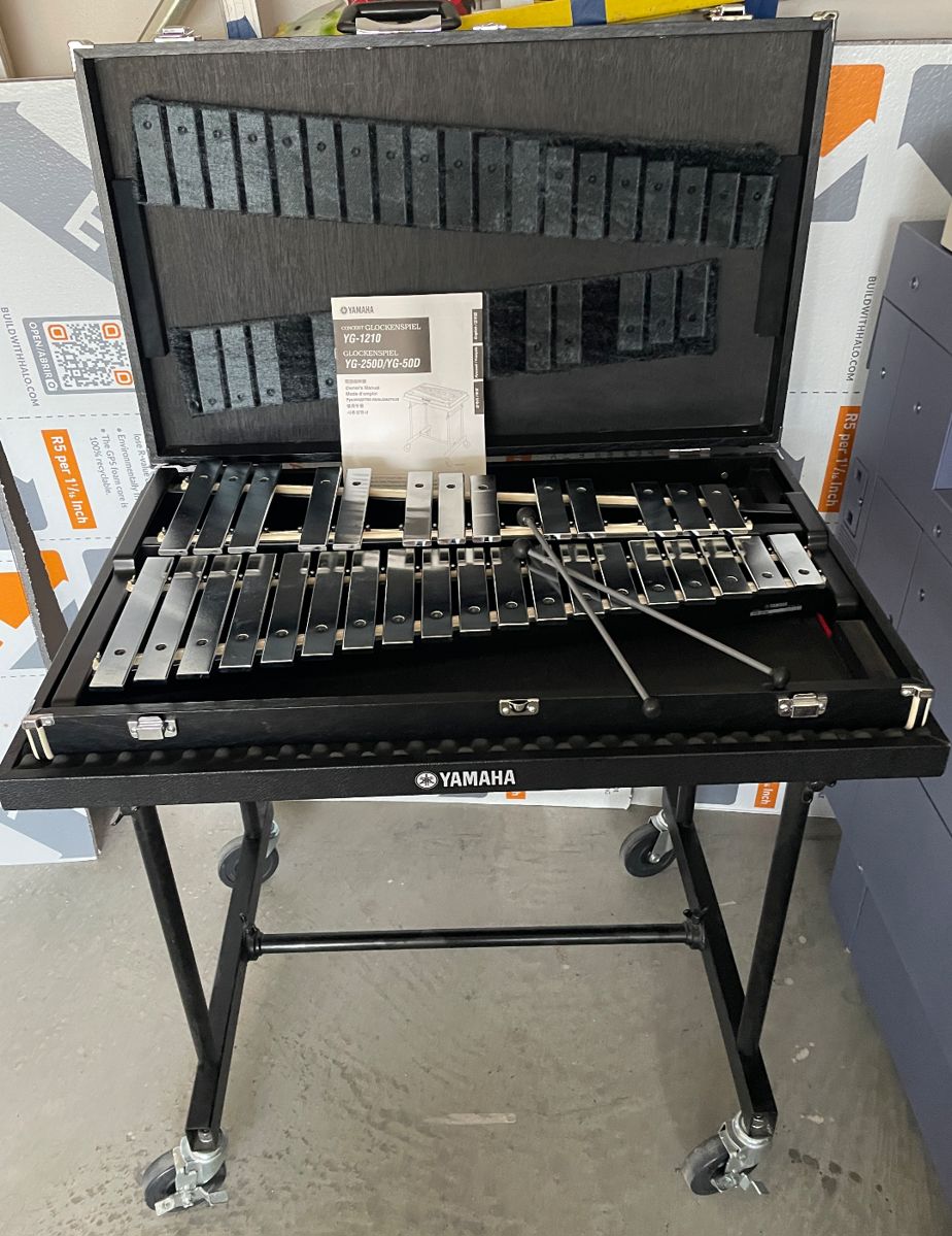 Glockenspiel Bell Set with carrying case and rolling cart with lock on wheels.