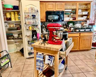 KITCHEN ISLAND WITH KITCHEN AID MIXER.