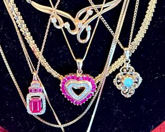 Fine jewelry. Gold and sterling. Removed daily. Security on premises. 