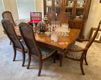 Formal dining table with six chairs and two leaves with matching server and China cabinet