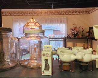 Kitchen scale,  vintage glass jars, personal sized butter crocks with warmers