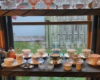 Depression glass, cups and saucers, more glass swervice ware