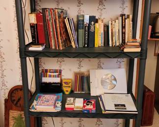 Lots of books, office supplies, lamp