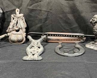 6 Cast Iron Pieces 2 Boot Jacks, 1 Match Holder, 1 Horseshoe, 1 Sheep Doorstop, 1 Dog Doorstop, 1 M