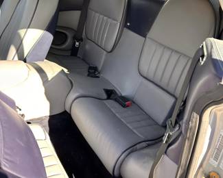  1998 Aston Martin DB7 Volante CONVERTIBLE 2-DR W/ a 3.2L L6 DOHC 24V SUPERCHARGER engine.