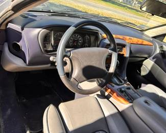  1998 Aston Martin DB7 Volante CONVERTIBLE 2-DR W/ a 3.2L L6 DOHC 24V SUPERCHARGER engine.