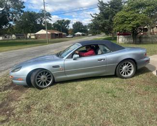  1998 Aston Martin DB7 Volante CONVERTIBLE 2-DR W/ a 3.2L L6 DOHC 24V SUPERCHARGER engine.