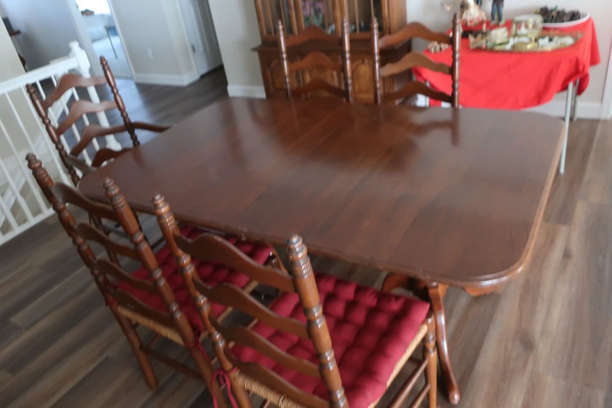 Ethan Allen Dining room table with 8 chairs. It has two leaves (18") and pads. The table is 66" x 42".
