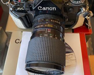 Canon A-1 with Accessories, Lenses and Manuals