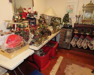 Christmas decorations, center pieces, stocking holders, Mikasa trinket boxes, animated santas, bookcase and stockings, stoarge drawers.
