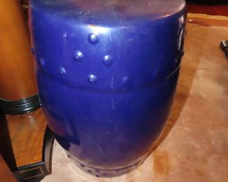 Blue ceramic garden stool.